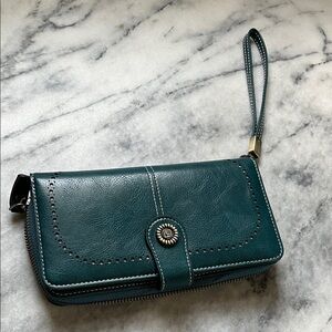 Women's Teal Wristlet Wallet with Decorative Snap Closure. Like new. Leather.
